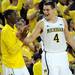 Michigan junior Jordan Morgan reacts to a dunk by Nik Stauskas in the second half against Iowa at Crisler Center on Sunday, Jan. 6. Michigan beat Iowa 95-67 in the Big Ten home opener. Melanie Maxwell I AnnArbor.com